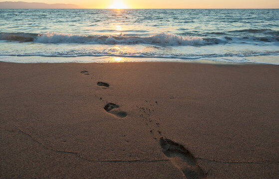 The sun sets in the distance in banderas bay; Puerto vallarta mexico