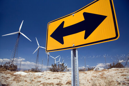 Wind Turbines And Road Sign; Palm Springs, California, United States Of America