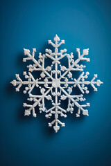 Classic snowflake captured in vintage-style film photography isolated on a monochrome gradient background 