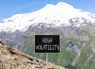 High volatility symbol. Concept words High volatility on beautiful black chalk blackboard....