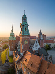 Aerial view of Wawel castle and Wawel cathedral during golden hour in the morning, Krakow, Poland - 648273337