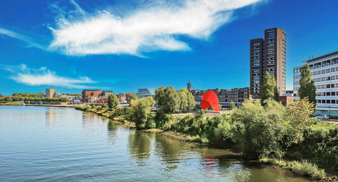 Venlo, Netherlands - September 9. 2023: Skyline of dutch city with river Maas in summer