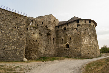 Fototapeta na wymiar A stone bastion and wall of Khotyn castle in Ukraine