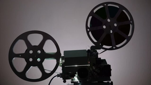 Watching a Movie on an Old 16mm Film Projector.
