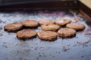 Burger Patties on a Flat Top Grill