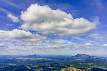 Cinder cones and high clouds to the west of Humphreys Peak near Flagstaff Arizona