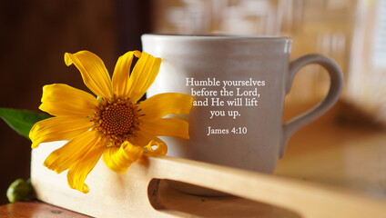 Yellow flower with a cup of coffee or tea and bible verse text message on it - Humble yourselves before the Lord, and He will lift you up. James 4 : 10. Christianity concept. - obrazy, fototapety, plakaty