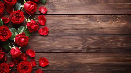 red roses on wooden background with copy space for text