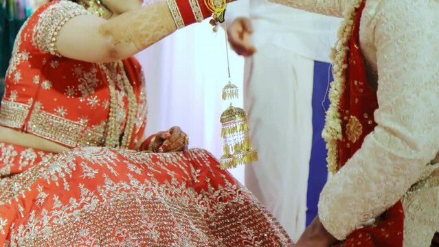 Indian Hindu couple giving their Rituals is being performed during wedding ceremony. closeup elements Rituals ceremony