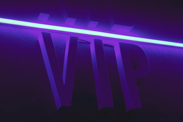Sign letters word vip very important person, popularity and status in violet purple neon light