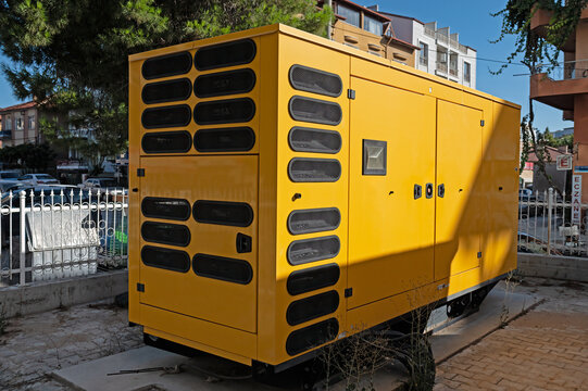 Large generator in yellow colour.