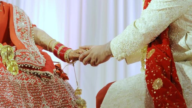 Indian Hindu couple giving their Rituals is being performed during wedding ceremony. elements ceremony