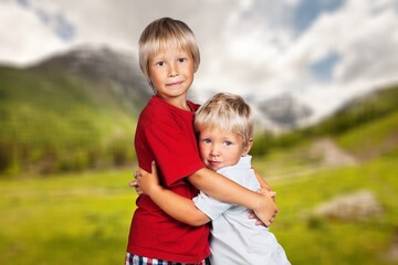 Fototapeta premium Portrait of happy cute children friends in a park