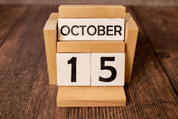Wooden cubes with date on white background. 15th of October - obrazy, fototapety, plakaty