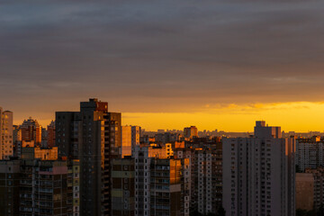 Sunset over soviet buildings of the Kyiv, capital of Ukraine