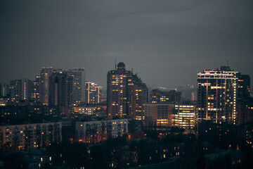 Fototapeta na wymiar night city urban view of light illuminated capital Kiev, Kyiv, Ukraine, aerial