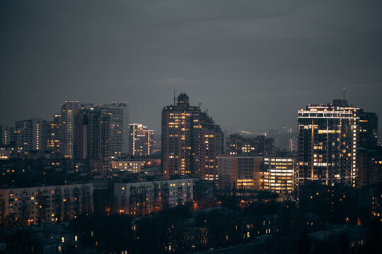night city urban view of light illuminated capital Kiev, Kyiv, Ukraine, aerial