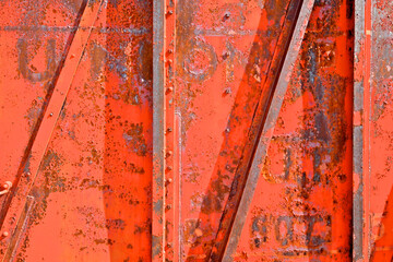 Rusted metal abstract . Reinforcement rods on side of old boxcar 