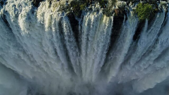Huge waterfall looking straight down aerial drone