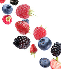 Many different berries flying on white background