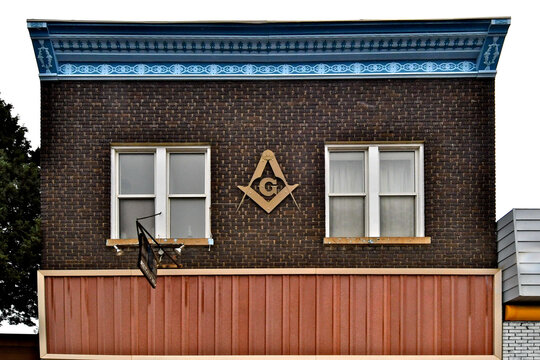 The masonic symbols of a square (virtue) compass (wisdom) and G (God) on second floor of refurbished building, Kemmerer, Wyoming 