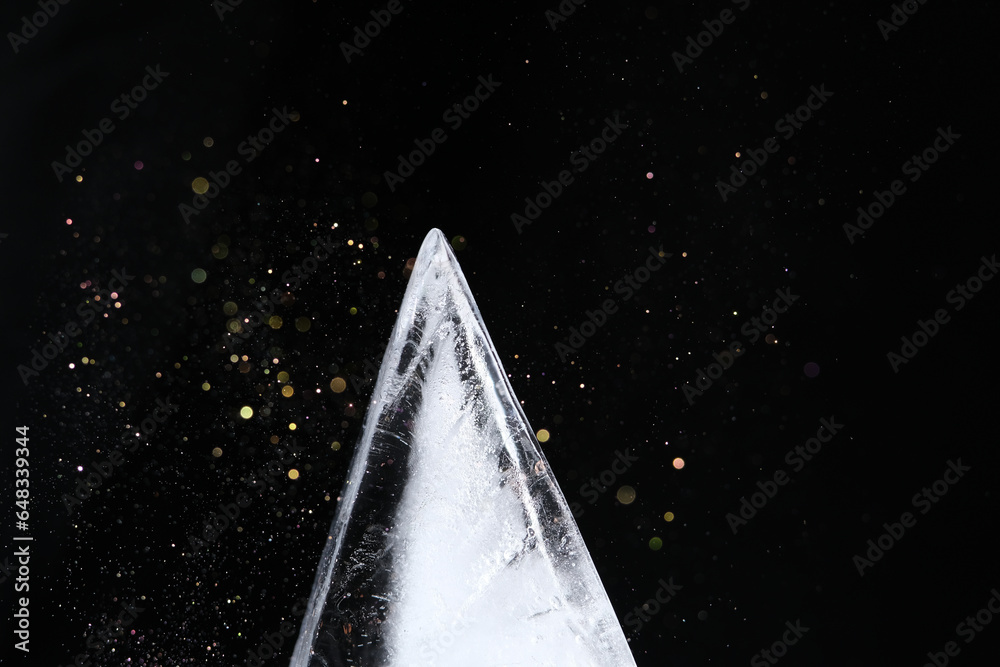 Canvas Prints triangle shape ice block on black background
