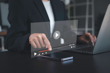 Businessman watches live content on smartphone, seamless internet connection. Live broadcast and playing content video in online technology, Online learning.