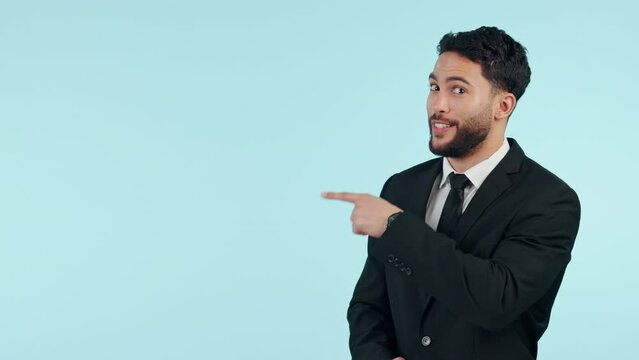 Secret, gossip or businessman in studio pointing isolated on blue background mockup space for news. Hush, whisper or face of sales person with deal, promotion or offer for privacy or announcement