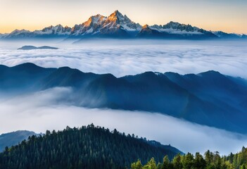  A majestic mountain range shrouded in mist - obrazy, fototapety, plakaty