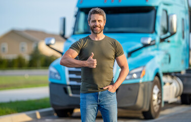 Semi trucks vehicle. Trucking owner. hispanic man posing in front of truck. Semi trucks vehicle....