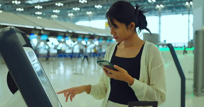 Young asian woman check in at airport terminal. Travel and Lifestyle concept.