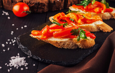 Bruschettas on cutting board close up