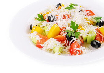 Fresh vegetable greek salad on white
