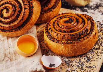Sweet roll with poppy seeds top view