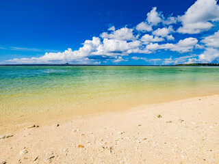 Beautiful view of tropical blue sea or ocean by the white beach and floating a cloud in summer, Okinawa in Japan, Nobody, Landscape or travel, High resolution over 50MP for wallpaper