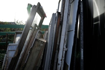 Some window panes and frames at vintage yard.