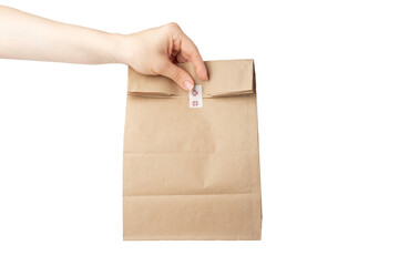 Lunch bag in hand isolated, grocery delivery, sustainable packaging,