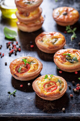 Tasty mini tart with cheese and mushroom. Appetizer for vegan.