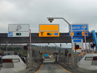 Impruneta, FI, Italy - February 19, 2023: motorway toll booth for toll payment and preferential...