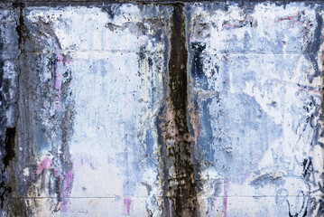 A cement wall covered in paint chipped by humidity. Vector cement texture background