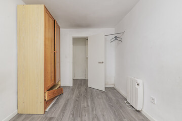 empty room with a rickety wardrobe