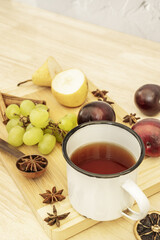 Having a tea surrounded by fresh fruit with delicious flavors