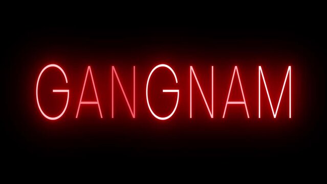 Flickering red retro style neon sign glowing against a black background