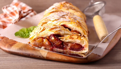 Plum and almond puff pastry strudel