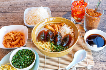 Congee century egg with pork congee with spring onion in a dish - Asian food style