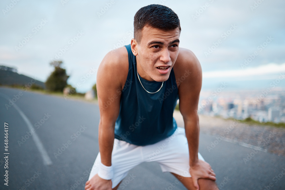 Sticker Sports, nature and man athlete breathing after running for race, marathon or competition training on mountain. Fitness, workout and young male runner on a break for an outdoor cardio exercise.