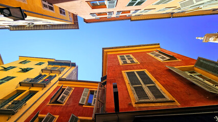 View of buildings and architecture, walls and windows architecture in Nice in the south of France. Old city Cote d'Azur, France on the French Riviera.