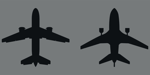 Fototapeta premium A set of airplane silhouettes. 2 pieces. Black silhouette. Vector on gray background.
