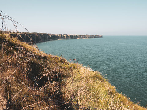 Wire fence on Normandy beach, France