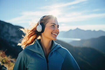 Fitness woman listening music outdoor